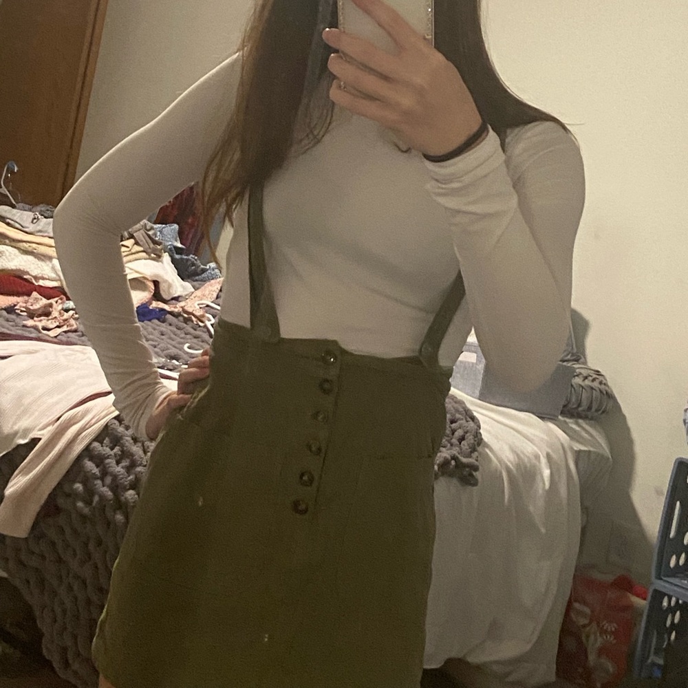 HYFVE army green skirt overall with a cross back strap.